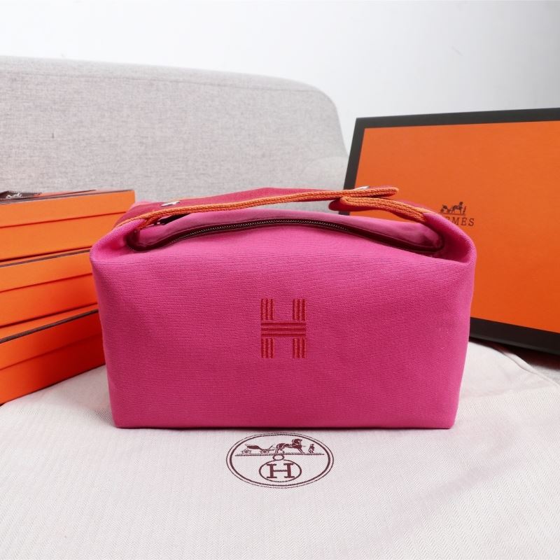 H**mes clutch bags